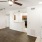 a kitchen with white cabinets