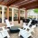 a patio with chairs and tables