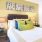 a bedroom with a bed and lamps