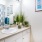 a bathroom with a large mirror
